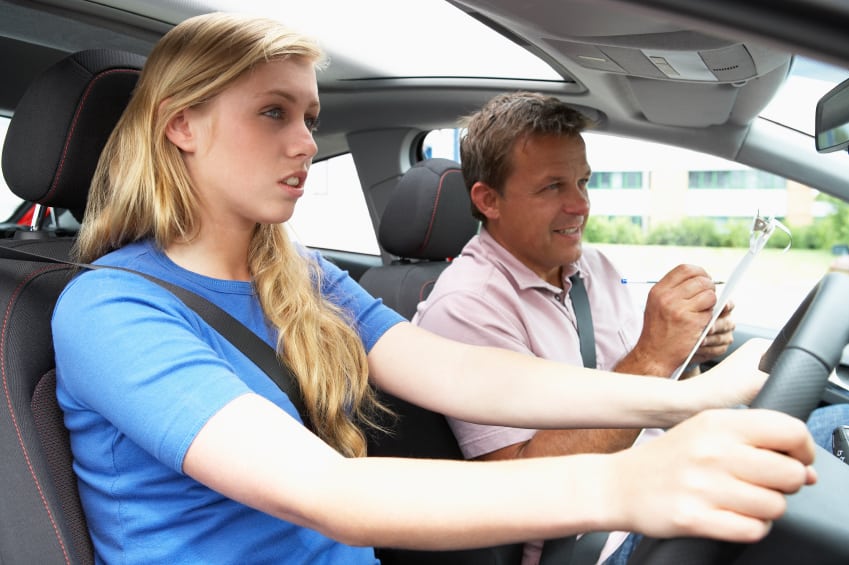 teenage-girl-taking-a-driving-lesson