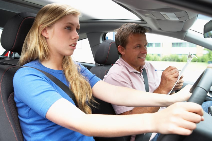 teenage-girl-taking-a-driving-lesson
