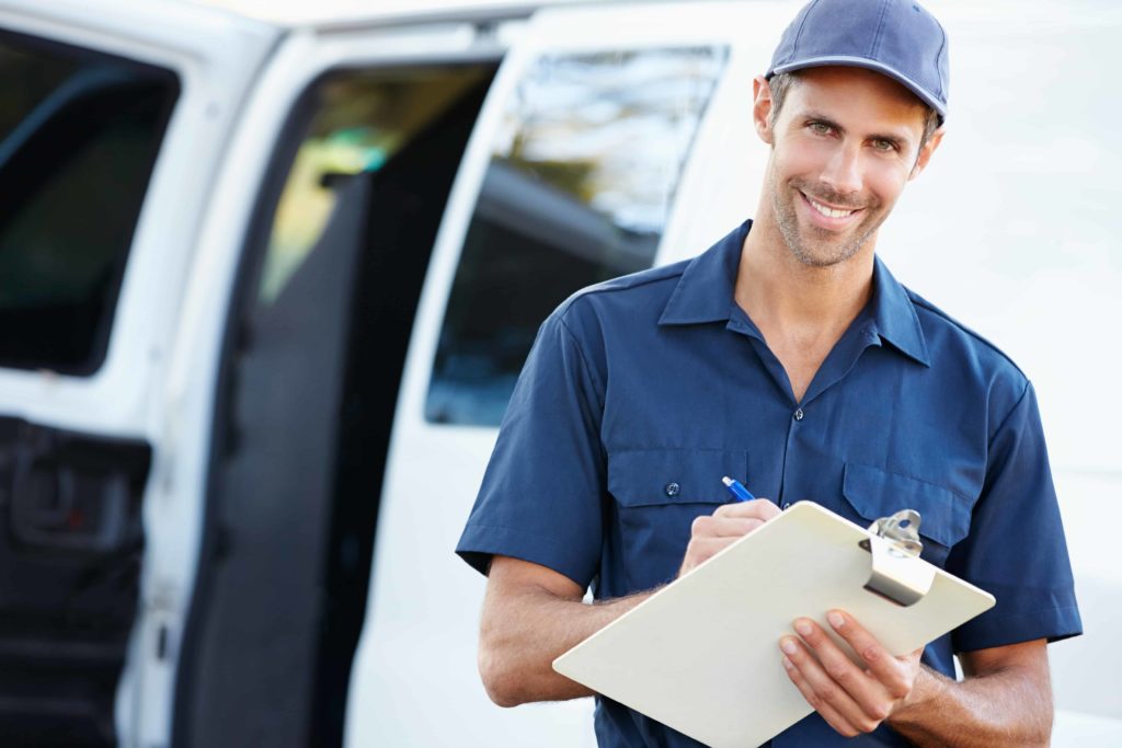 portrait-of-delivery-driver-with-clipboard